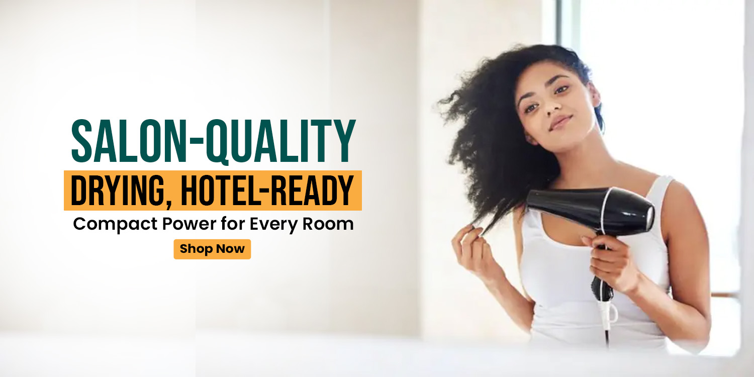 Woman using a black hair dryer in a modern hotel bathroom, demonstrating compact, salon-quality drying ideal for hospitality settings.